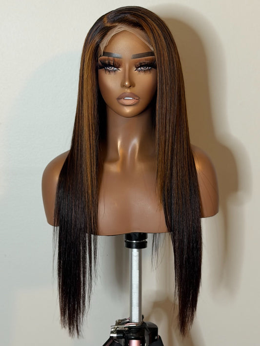 Front view of Sienna custom-colored kinky straight glueless wig featuring dimensional brown, caramel, and copper highlights.