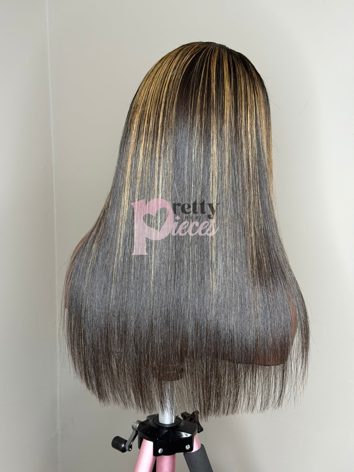 Aylin pre-loved wig back view showing straight texture and highlights