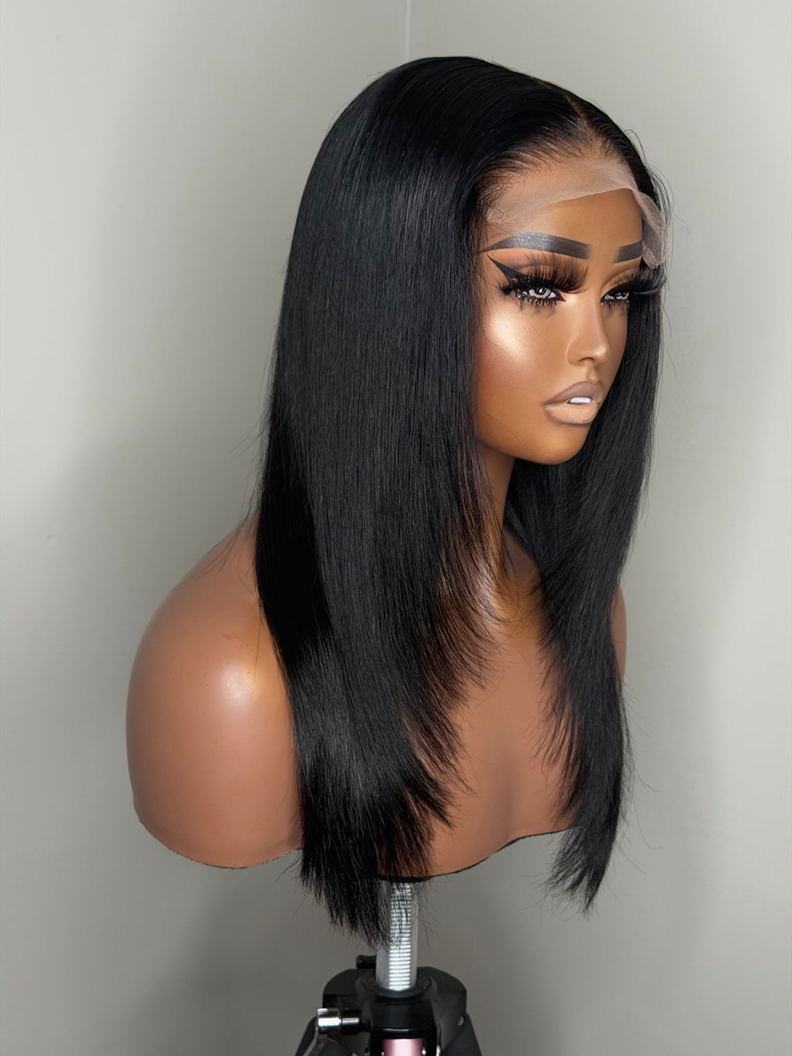 18-inch jet black layered human hair wig angled view