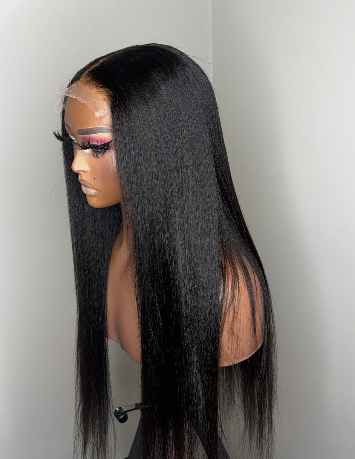Neesha Natural 22 inch kinky straight closure wig side view