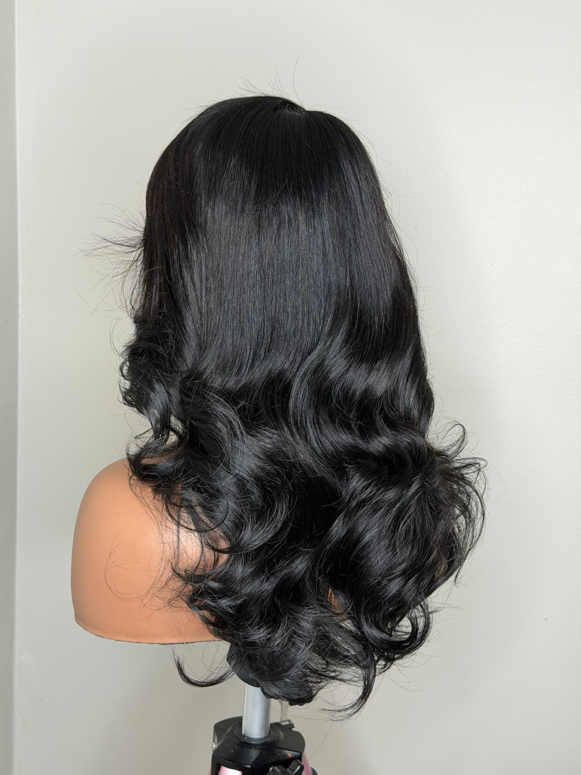 24 inch vendor test lace wig with layered curls, back view