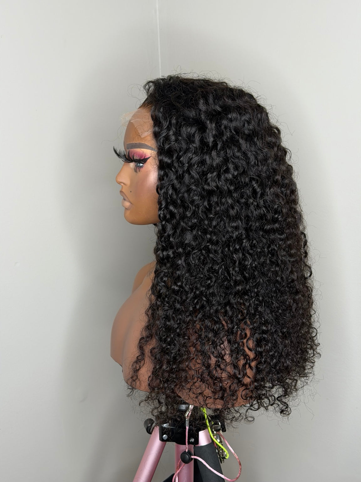 Zuri 22 inch Burmese curly wig side profile